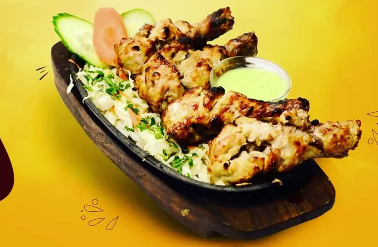 Afghani Chicken Tikka at Baba Chicken Edmonton – tandoor-grilled marinated chicken